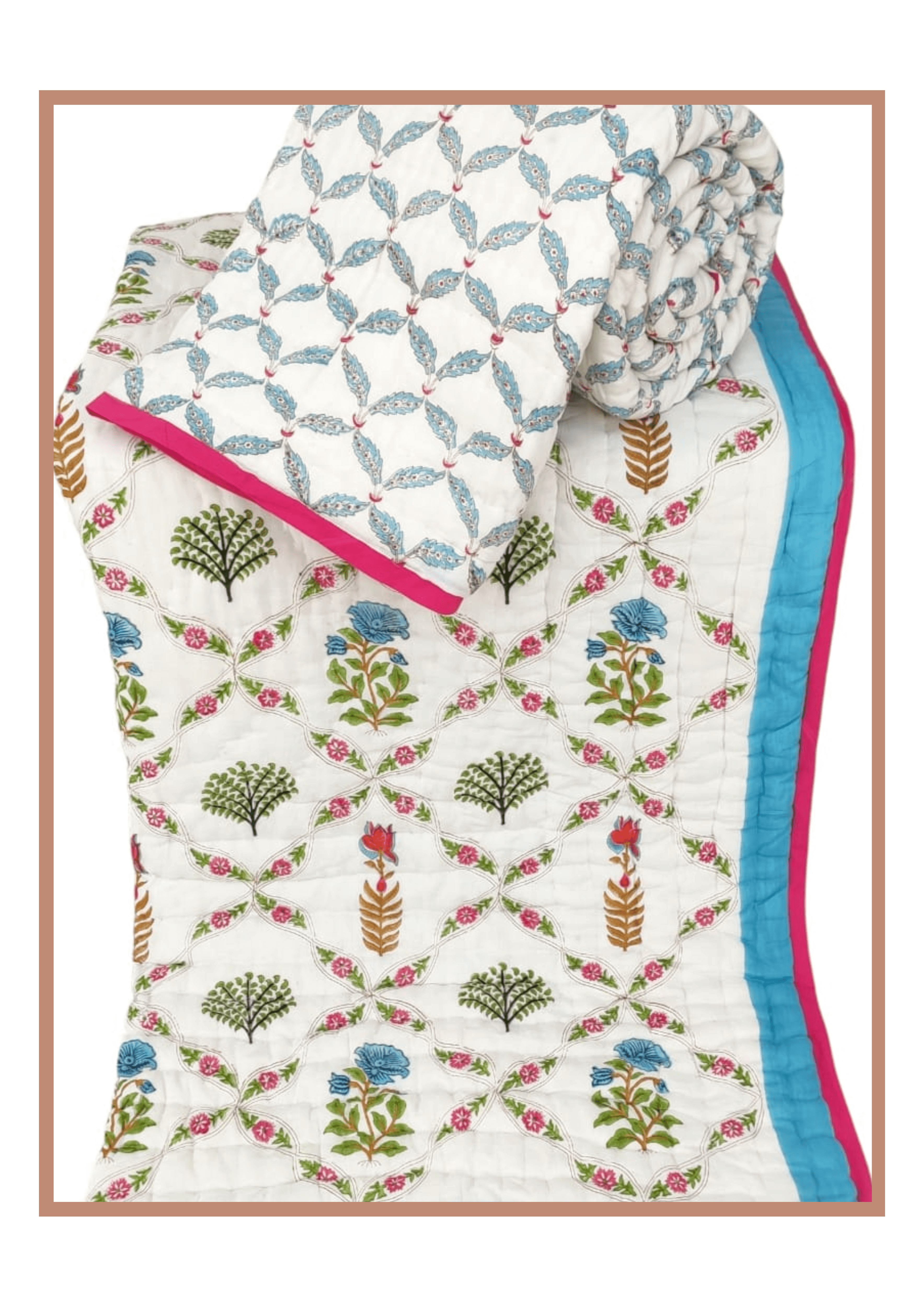 Blush Vine Reverie quilt displayed in twin size format