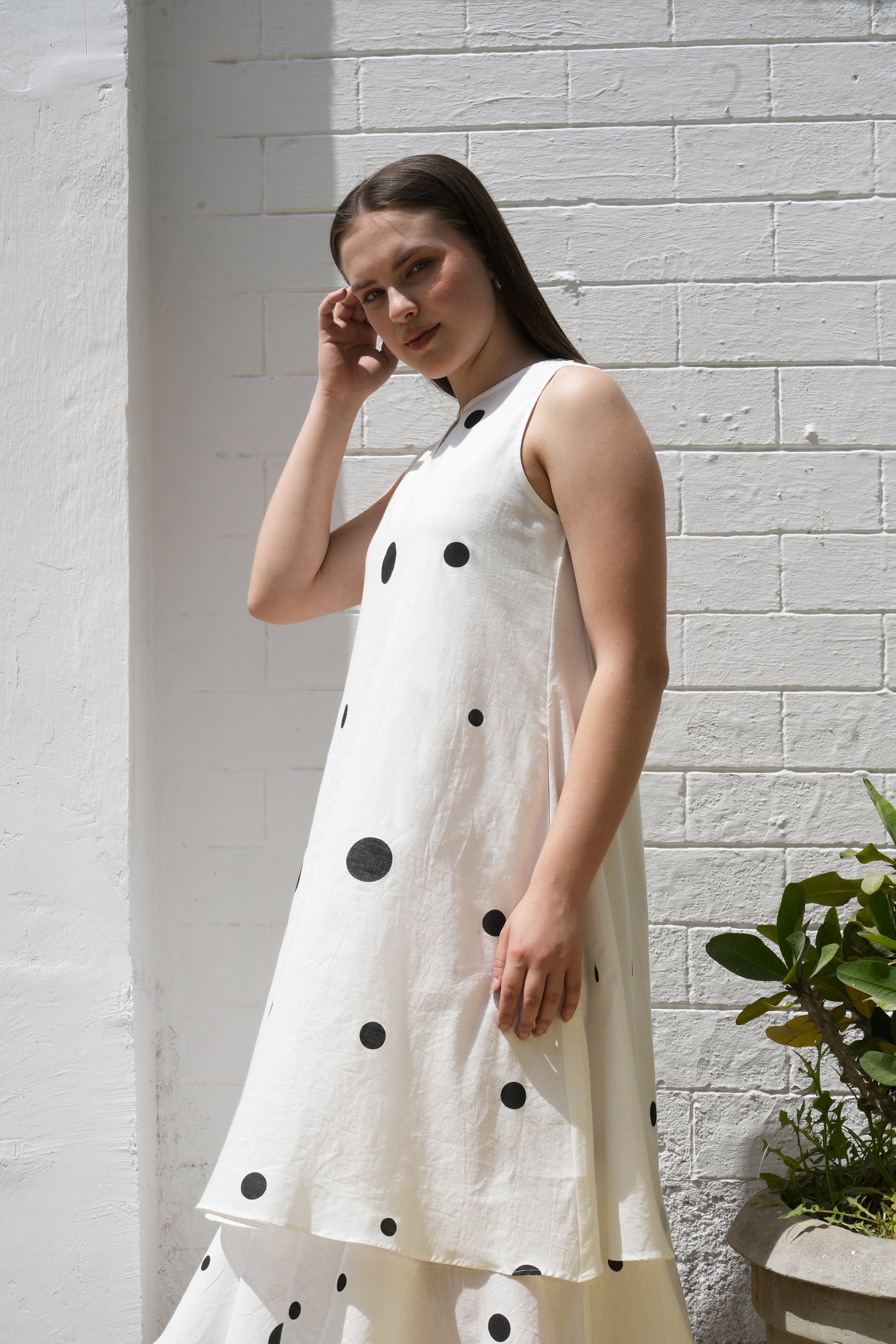 Side view of Classic Dots dress showing silhouette and flow