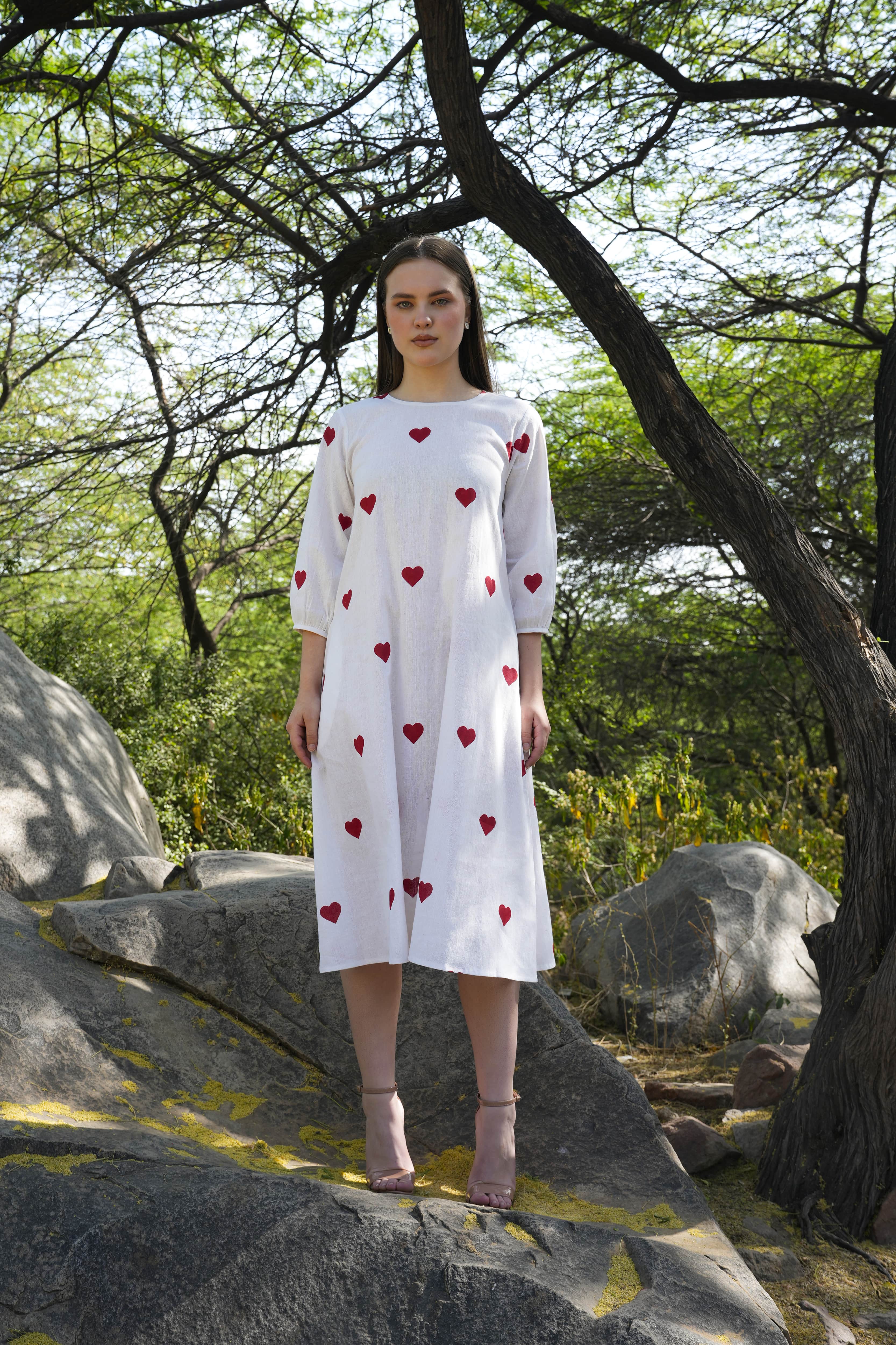 Heartline dress featuring subtle heart-inspired patterns, front view