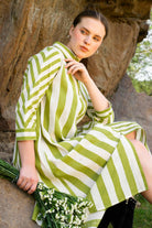 Close-up of Olive Echo dress fabric and neckline