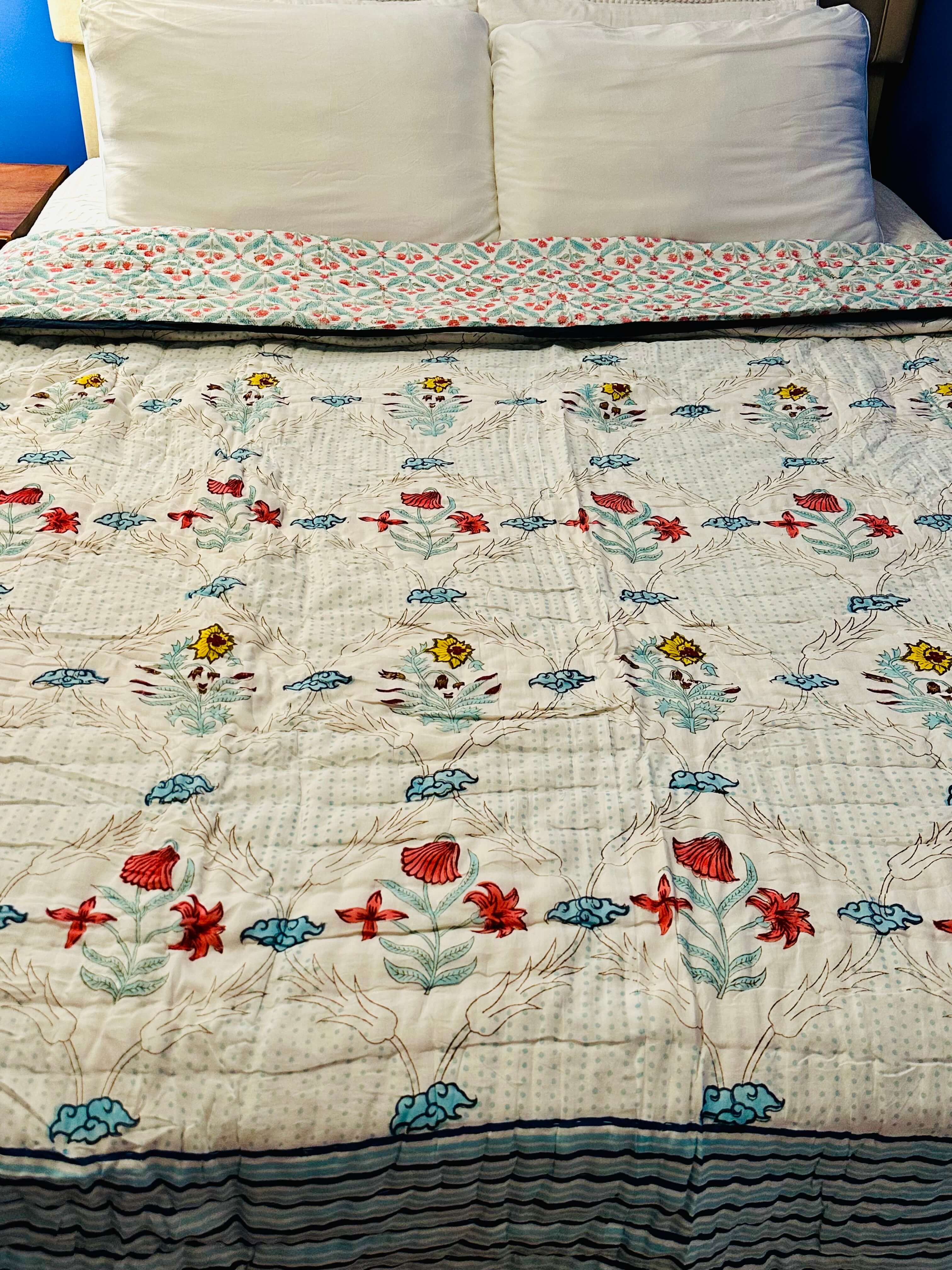 Morning Meadow quilt with fresh floral meadow design, front