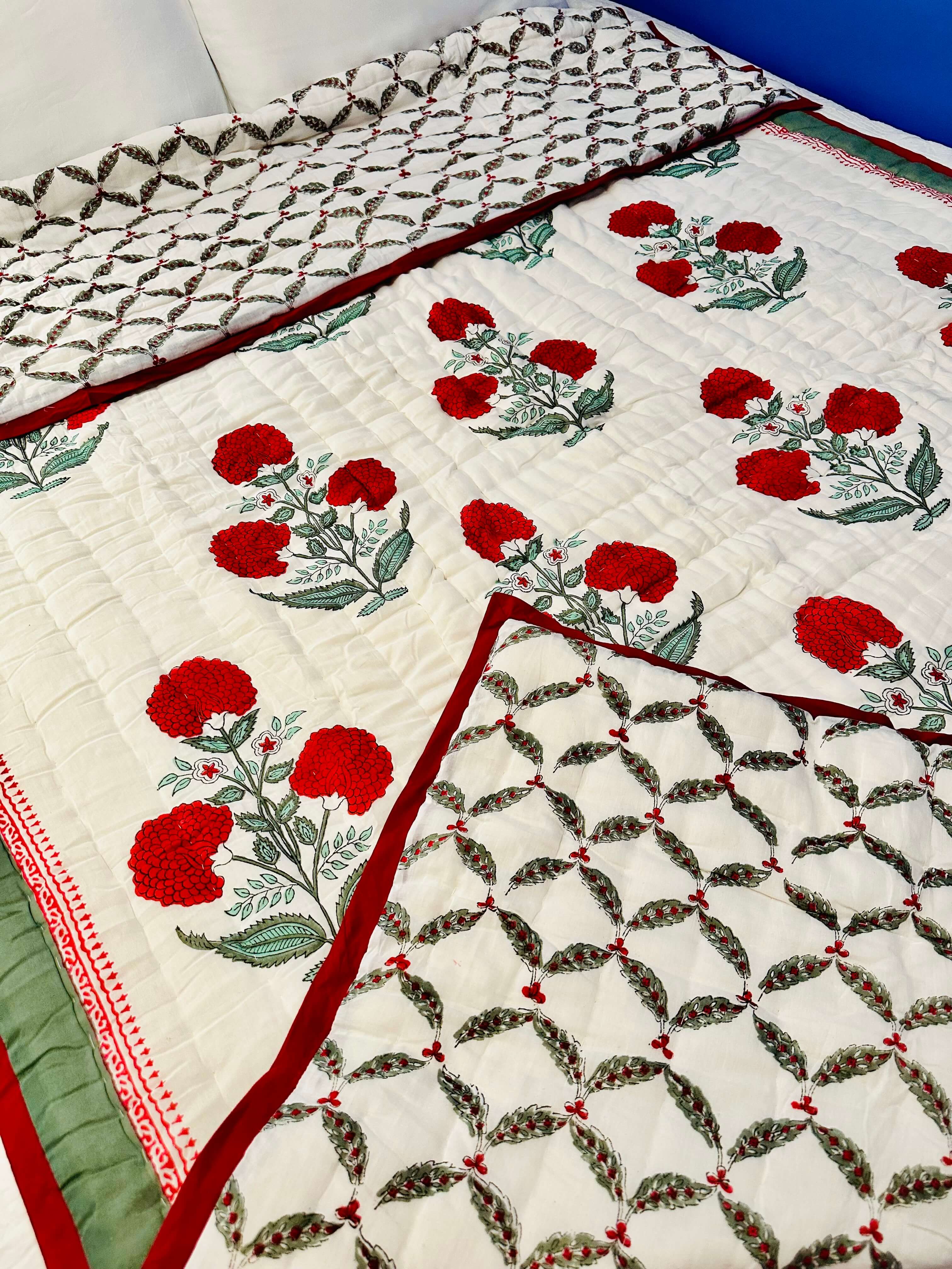 Red Dahlia quilt border detailing with floral accents