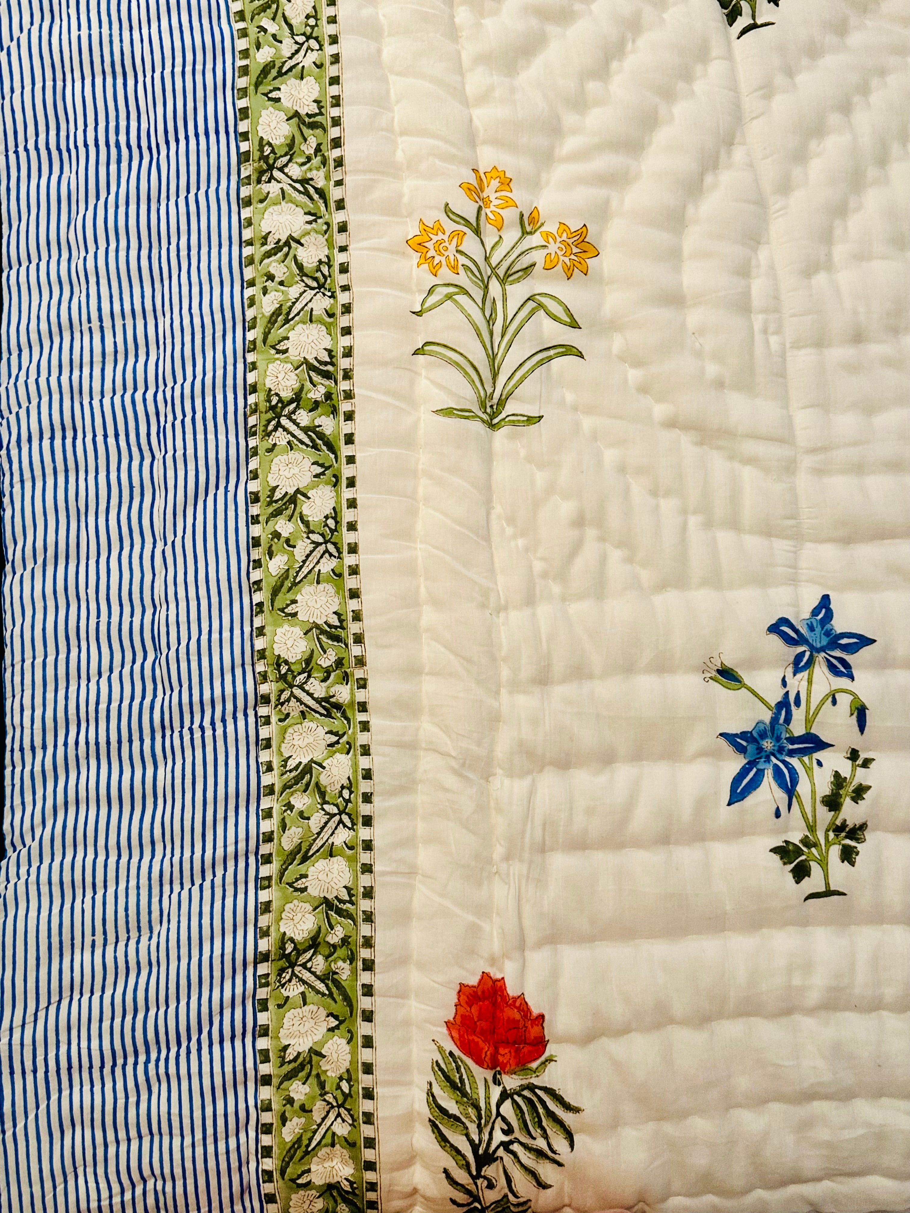 Sea Petals quilt with soft ocean tones, front full display