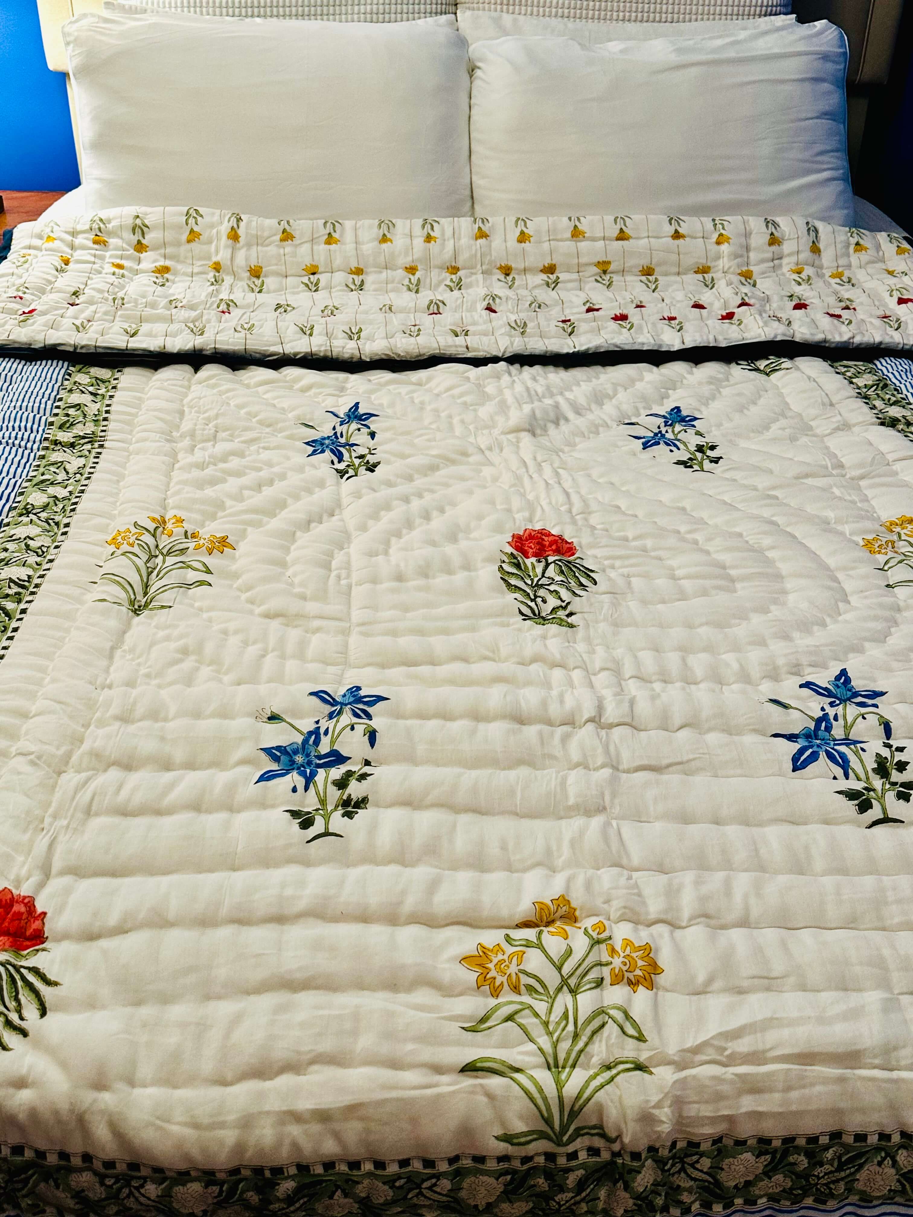 Sea Petals quilt with soft ocean tones, front full display