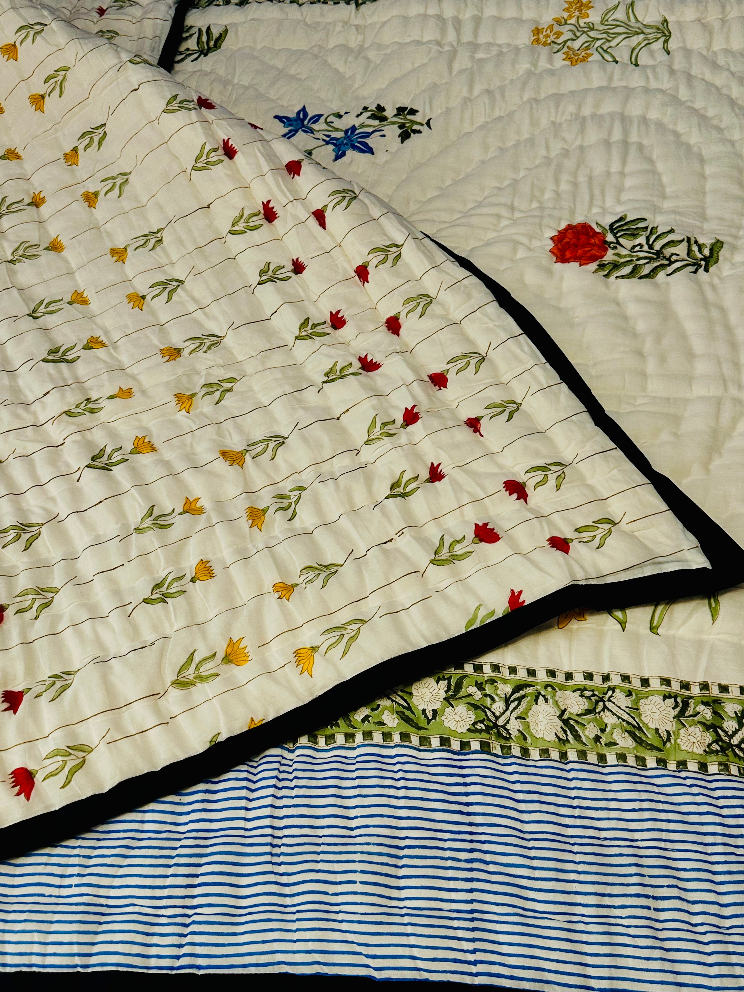 Sea Petals quilt with soft ocean tones, front full display