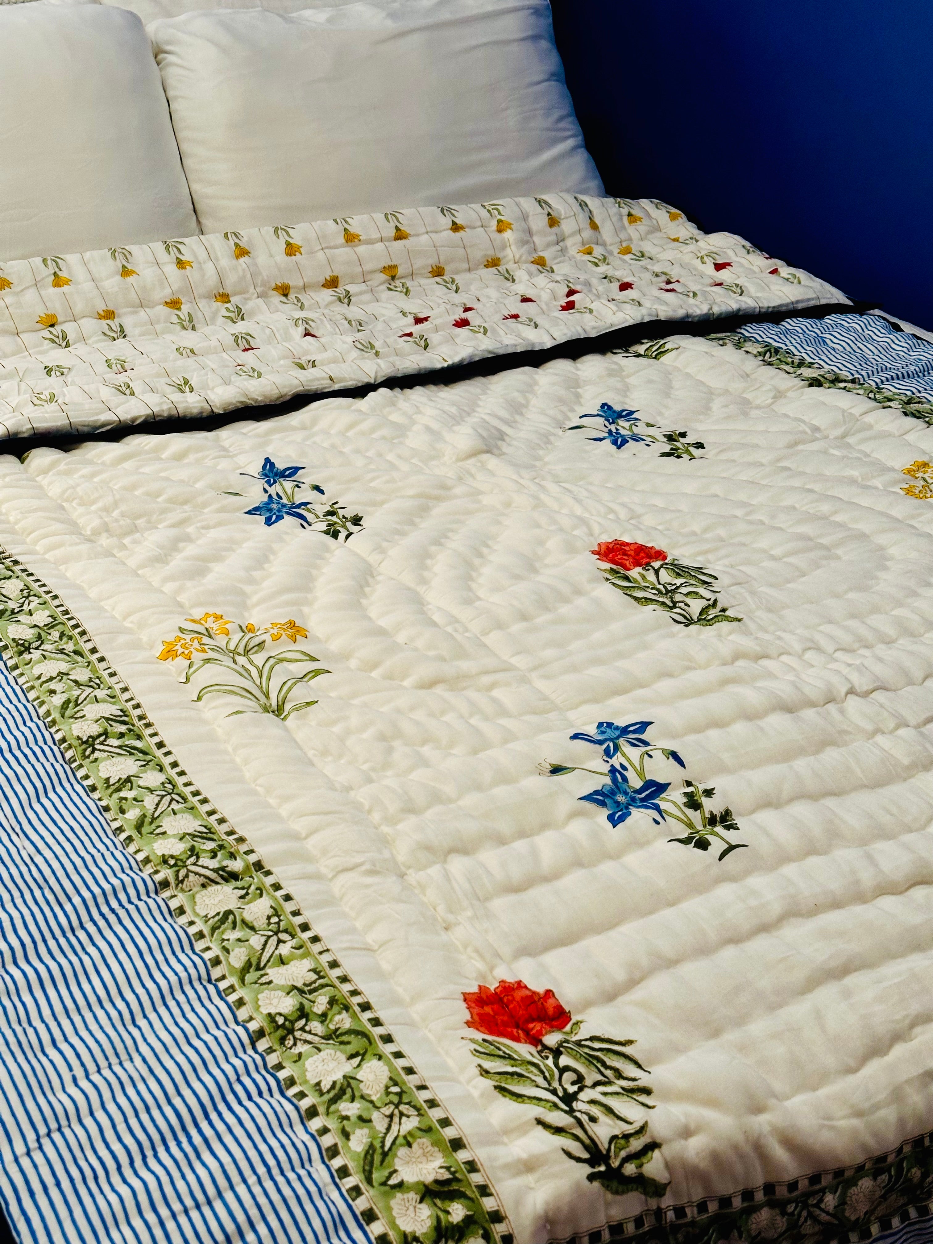 Sea Petals quilt with soft ocean tones, front full display